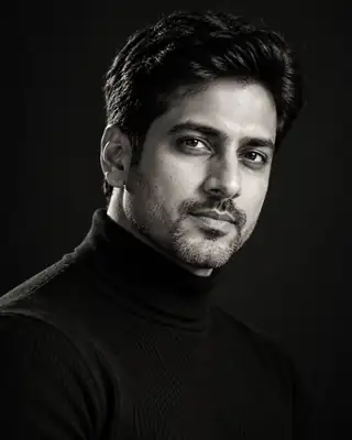 AI-generated sample headshot in the Noir Editorial style